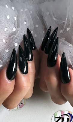 Classic Black Stiletto nail design by Zuzu Nails & Beauty in Jacksonville, Florida