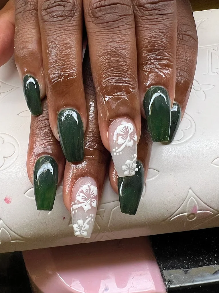 Emerald Hibiscus nail design by Zuzu Nails & Beauty in Jacksonville, Florida